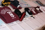 Silent auction table with Trojan trend wear
